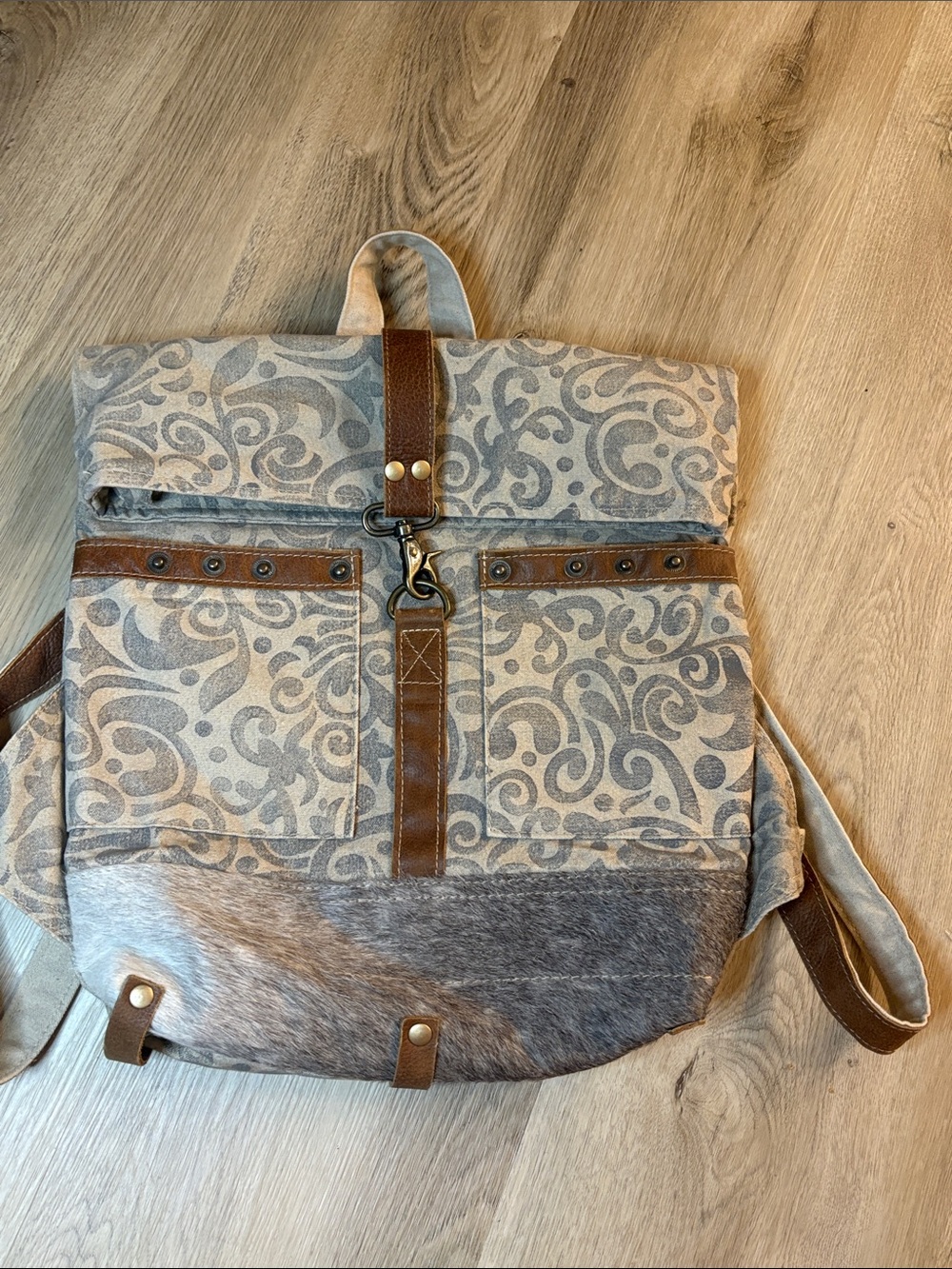 Myra Bag Floral Cowhide & Upcycled Canvas Backpack leather boho rodeo festival